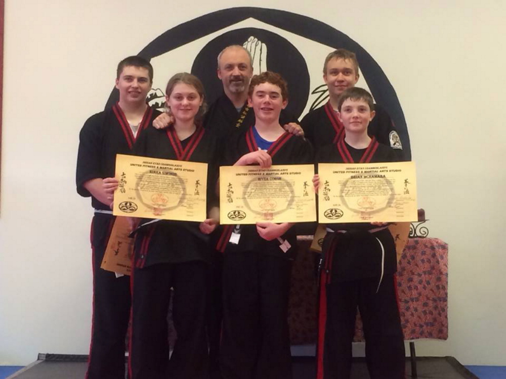 United Fitness in Winthrop has announced its newest junior black belts. Front, from left, are Kiara Simonds, River Coron and Brian McNamara; back, from left, are Devin White, Shihan Ryan Chamberland and Nathan Cram. These students are also all part of the Kosho Leadership team, assisting in classes with the younger martial students, travel to seminars and do extra training to be part of the team.