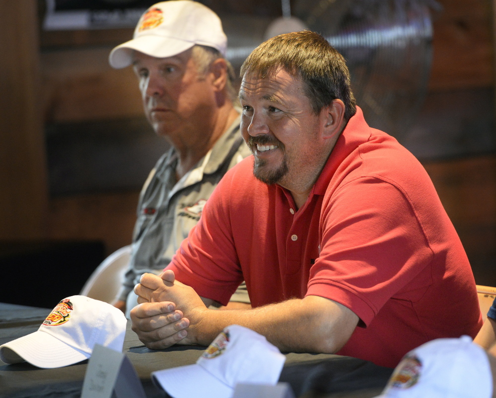 Ben Rowe smiles as he takes questions during the Oxford 250 media day at Bentley’s Saloon in Arundel Wednesday. To the right is Mike Rowe, who said “We’re running good, we’re running up front and I see no reason why we can’t win this thing.”