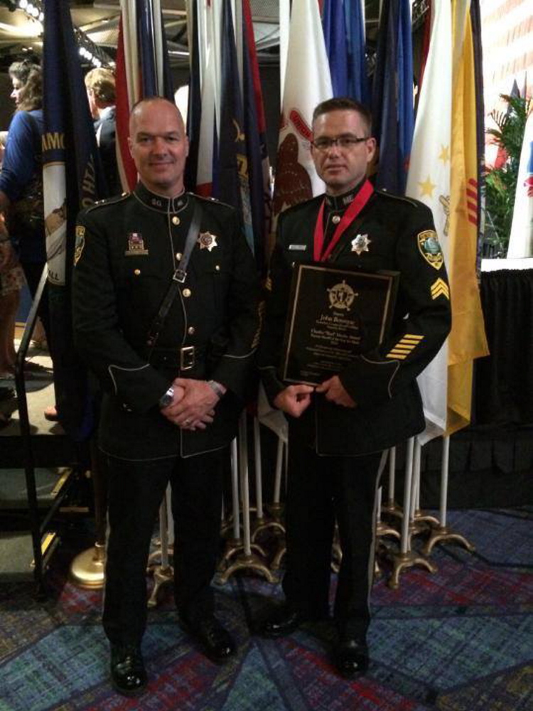 Kennebec County Sheriff Randall Liberty and Sgt. John Bourque following the awards ceremony in Texas.