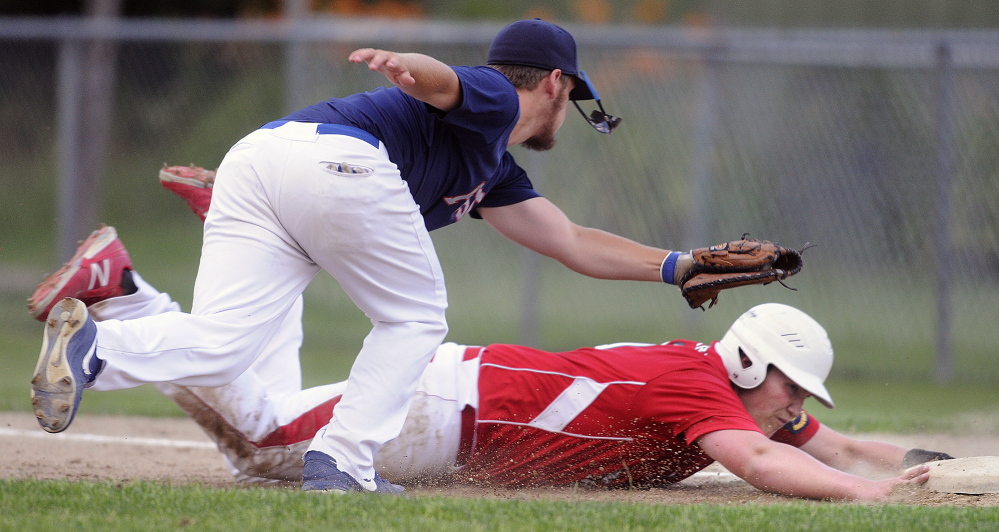 Post 51’s Zach Mattieu attempts to tag Red Barn’s Taylor Lockhart at first Thursday during an American Legion playoff game in Augusta.