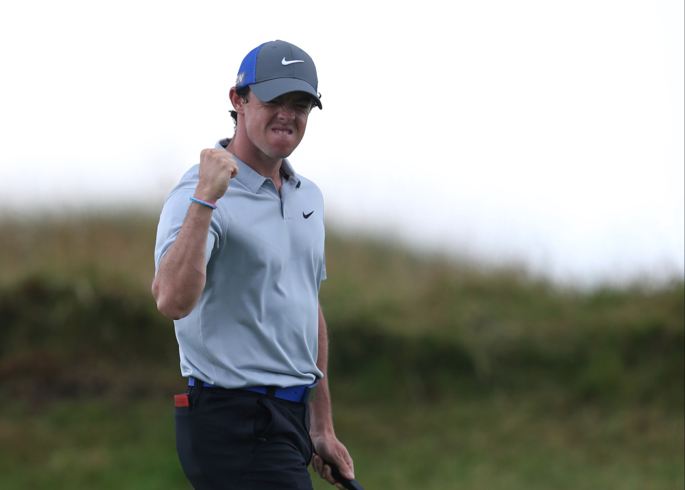Rory McIlroy celebrates a birdie on the 14th hole during the third round of the British Open on Saturday.