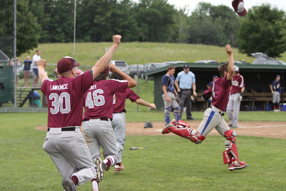 Members of the Central Maine 15-under Babe Ruth team celebrate after they beat Auburn 2-1 to capture the state championship Sunday in Augusta.