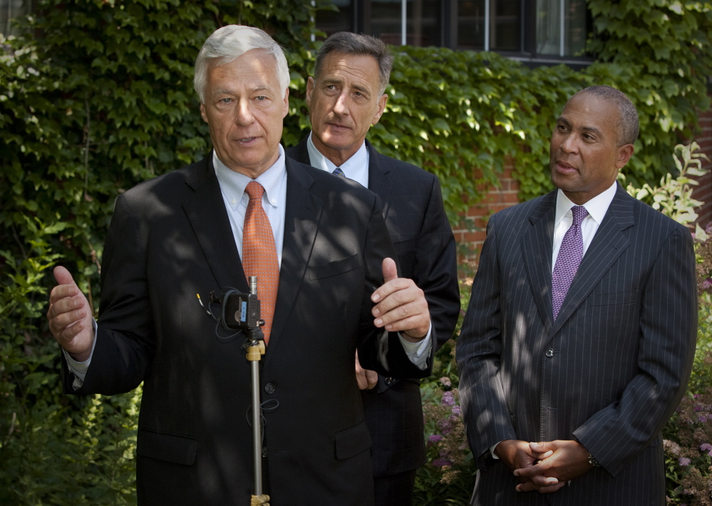 Democratic candidate for governor U.S. Rep. Mike Michaud speaks during a news conference Monday at the Cumberland Club in Portland. Gov. Peter Shumlin, of Vermont, center, and Gov. Deval Patrick, of Massachusetts, right, came to Maine to lend support to Michaud.