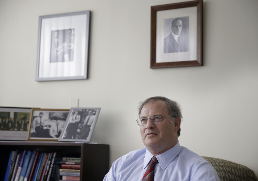 In this July 9, 2014 photo, economist David Levy poses for picture in his office in Mt. Kisco, N.Y.
