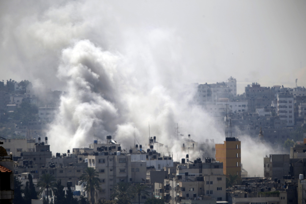 Smoke from an Israeli air strike rises over Gaza City on Wednesday.
