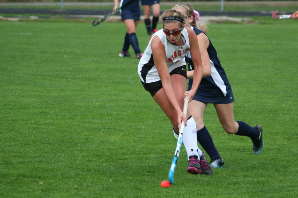 Bethany Winkin, seen here in action for Winslow High School, will play Division I field hockey at Bryant.