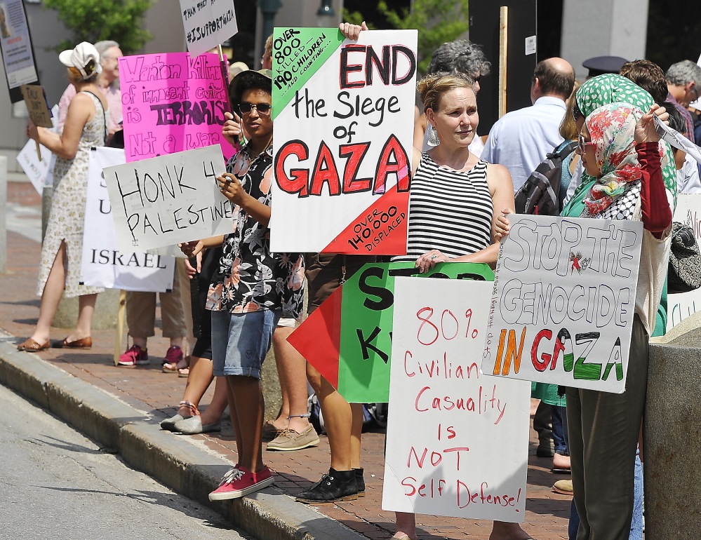 PORTLAND, ME - JULY 24: Pro-Palestinian protesters condemn Israel in a protest in Monument Square. (Photos by Gordon Chibroski/Staff Photographer)