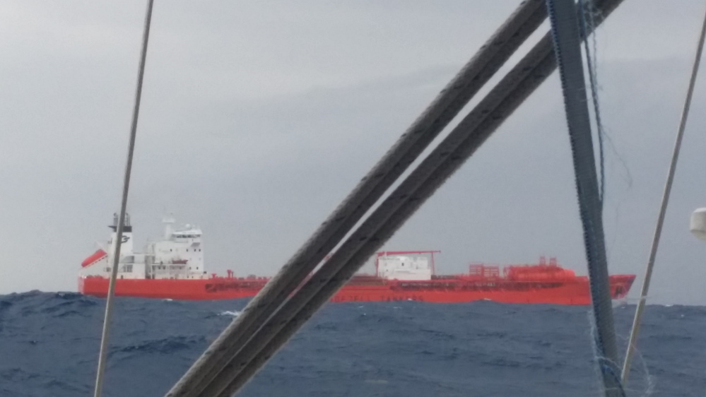The Bow Clipper, a Norwegian tanker, seen from a distance of two miles as it arrived May 22 to rescue the crew of the Elusive.