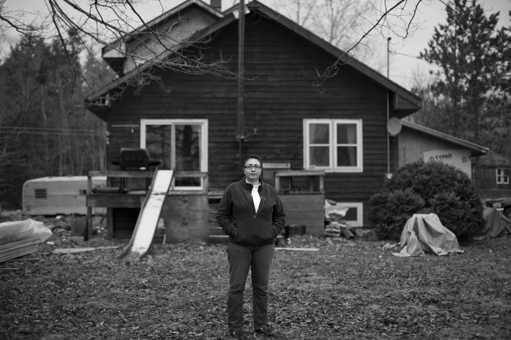 INDIAN TOWNSHIP, ME - APRIL 28: Stephanie Bailey stands for a portrait in the front yard of her Indian Township home Monday, April 28, 2014. A fearless advocate for her people, Bailey has run into roadblocks put up by tribal government when she tried to publish, first in print and then through email, a weekly newsletter informing the community of goings on in tribal government. (Photo by Gabe Souza/Staff Photographer)