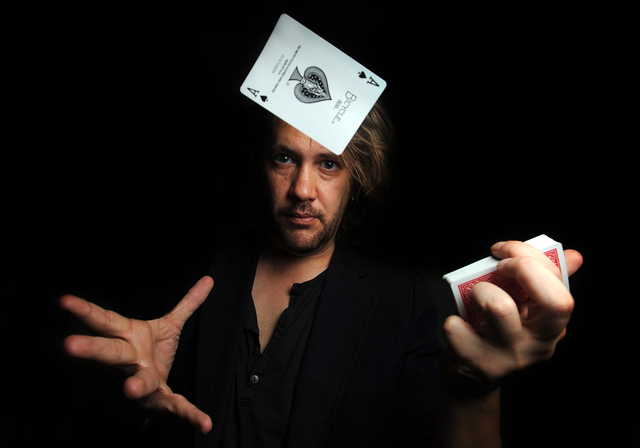 Bill VonTobel highlights a few of his up-close card tricks on Wednesday. VonTobel will be performing his Las Vegas act at the East Madison Grange this Friday and Saturday nights at 7:30. 