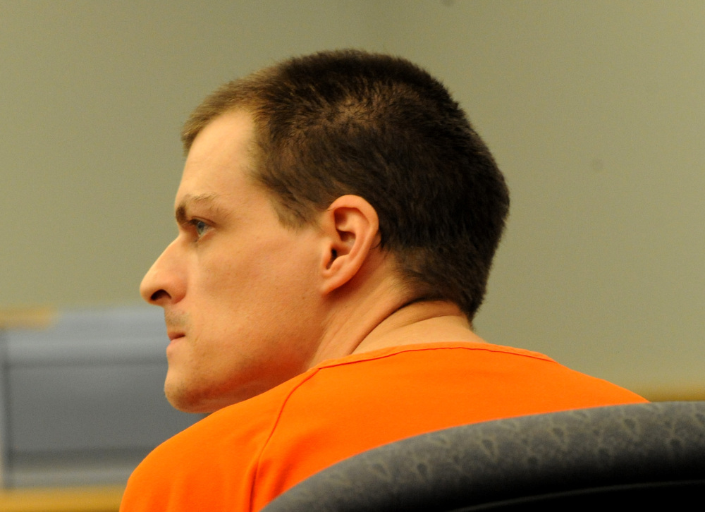 Nathaniel Kibby listens during a court hearing Wednesday in Ossipee, N.H.