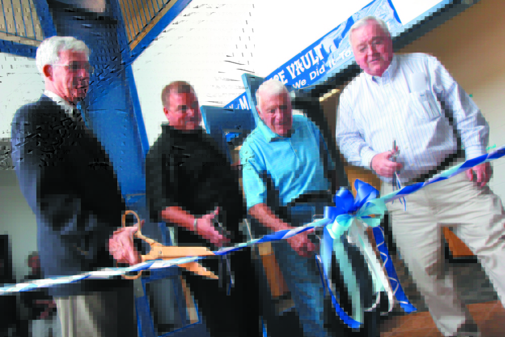 The Bank of Maine Ice Vault, at the site of the former Kennebec Ice Arena, officially opened in July 2012 in Hallowell with a ribbon cutting ceremony. From left to right is Peter Thompson of the Kennebec Valley Chamber of Commerce, Steve Prescott, Rosy Santerre, a former owner of KIA, and owner Peter Prescott.