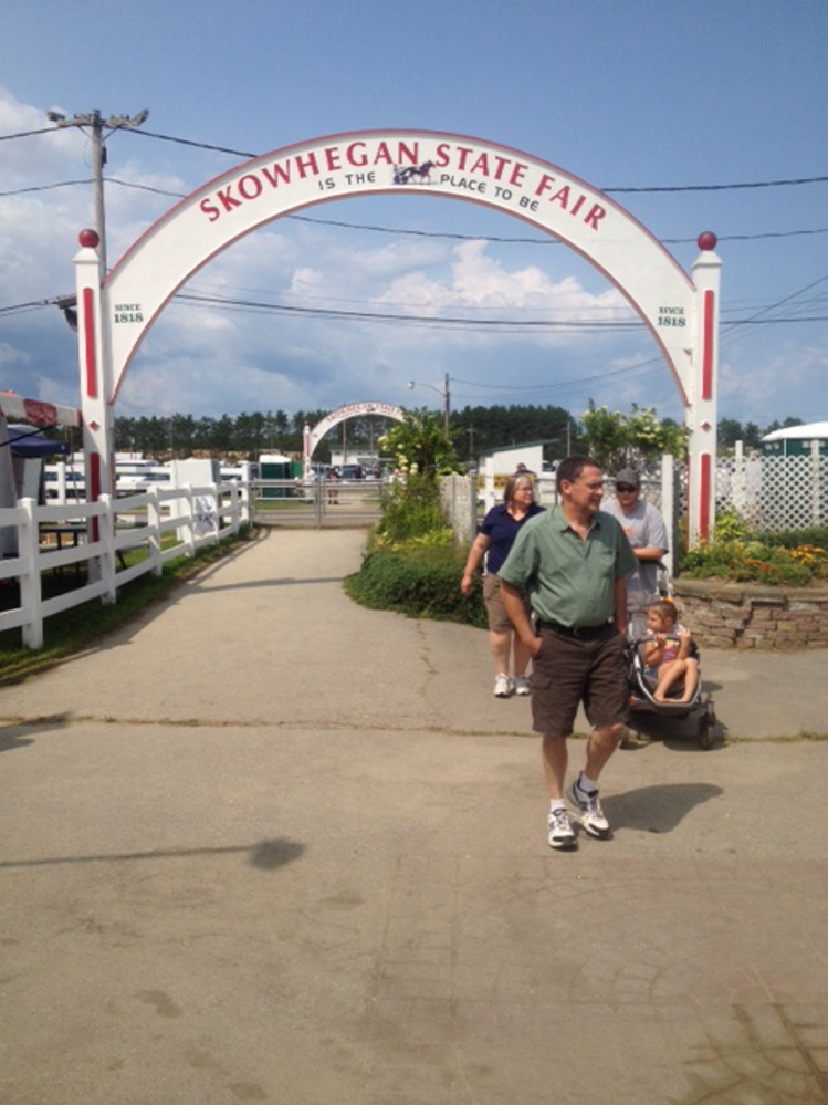 Double arches mark the entrance to the midway Sunday during the 196th annual Skowhegan State Fair.