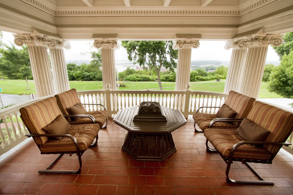 The second floor porch of the West Mansion looks over Portland’s Western Promanade.