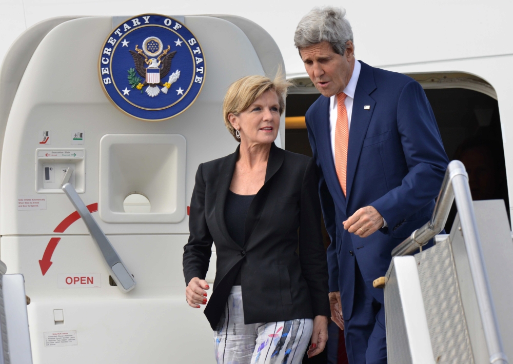 U.S. Secretary of State John Kerry, right, and Australian Minister for Foreign Affairs Julie Bishop arrive at an airport in Sydney, Monday.