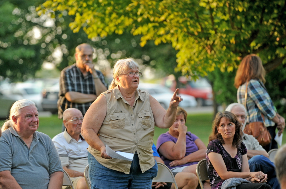 Patricia Lanning, center, speaks during a special town meeting in Benton on Monday. The town voted down a fireworks ordinance that would have restricted the use to Independence Day only.