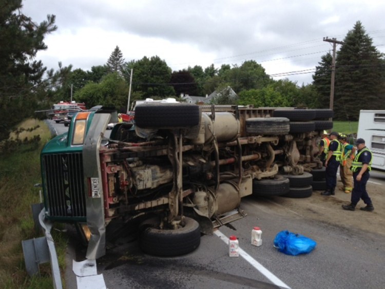 A four axel, eight wheel dump truck rolled over Tuesday on U.S. Route 202 in Winthrop, dumping a load of gravel. The operator said he yielded to an ambulance and couldn’t correct, which caused the truck to roll over on its side, according to state police. Traffic is down to one lane. There are no injuries, except bumps and bruises for the operator.