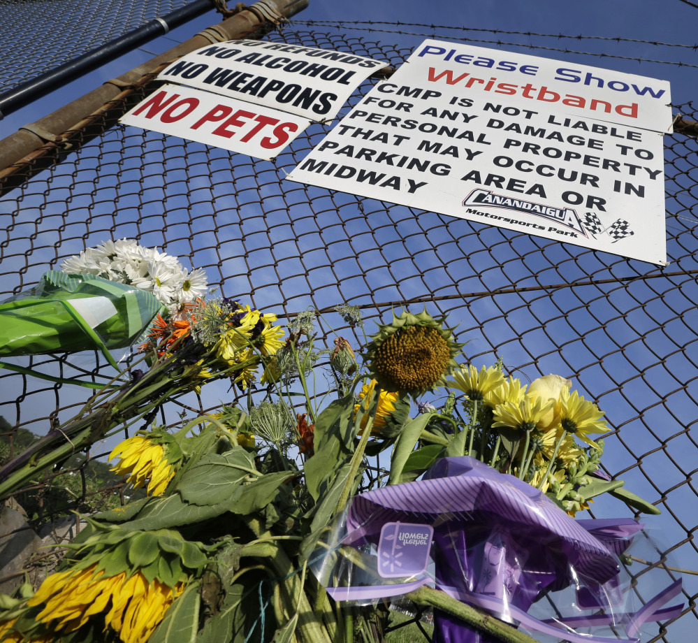 The Associated Press
A small memorial of flowers is seen at Canandaigua Motorsports Park Monday, Aug. 11, 2014, in Canandaigua, N.Y. On Saturday night, Tony Stewart struck and killed Kevin Ward Jr., 20, a sprint car driver who had climbed from his car and was on the track trying to confront Stewart during a race at the track in upstate New York. Ontario County Sheriff Philip Povero said his department’s investigation is not criminal and that Stewart was “fully cooperative” and appeared “very upset” over what had happened. (AP Photo/Mel Evans)
