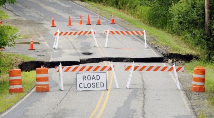 Heavy rains washed out a section of Town House Road on Thursday in Chelsea. There was over three inches of rainfall over night in many parts of central Maine.