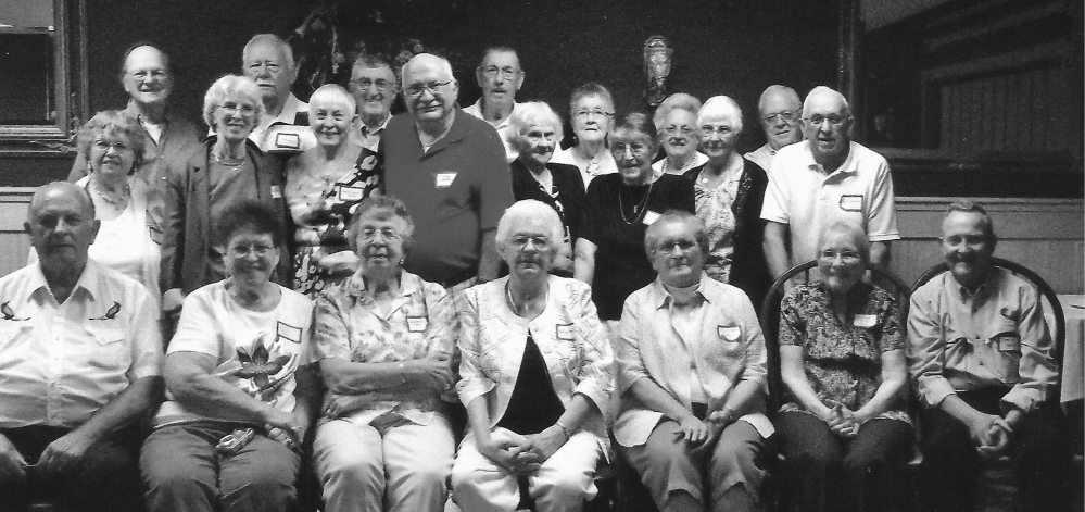 In front, from left, are Roy Pike, Bonita White Strout, Gayle Benson Chase, Evelyn Clark Dutil, Gail Adams Karkos, Esther Vivian Bell and Steve Mayo. Middle row, from left, are Melissa Eaton Knowles, Shirley Neil Lorette, Connie Casler Mayo, Francis Lorette, Edna Tyler Rose, Theda Williams Fairbanks, Marion Tyler Hinds and Lyle Karyos. Back row, from left, are Norman Beisaw, Clifton Harris, Robert Ridley, Douglas Fletcher, Leona Seamon Leavitt, Lauralee Perkins Davis and Ronald Melendy.