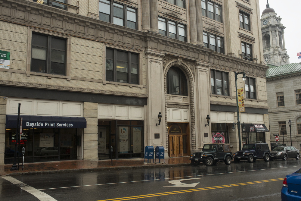 The front half of the Masonic Temple on Congress Street in Portland, shown Wednesday, will be auctioned off this fall. It offers nearly 50,000 square feet of commercial office and retail space.