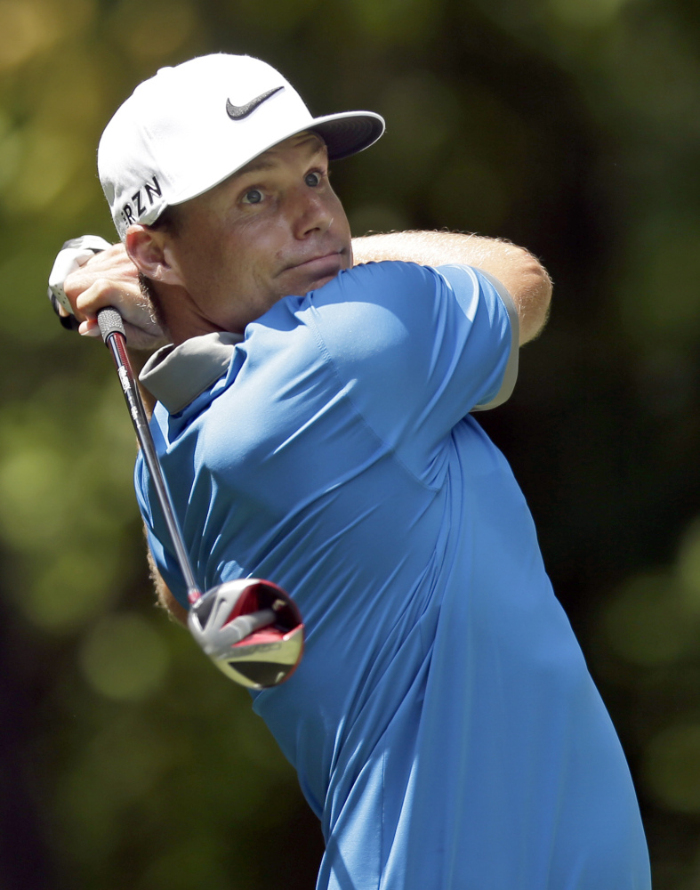 The Associated Press
Nick Watney watches his tee shot on the second hole during the third round of the Wyndham Championship golf tournament in Greensboro, N.C., Saturday.