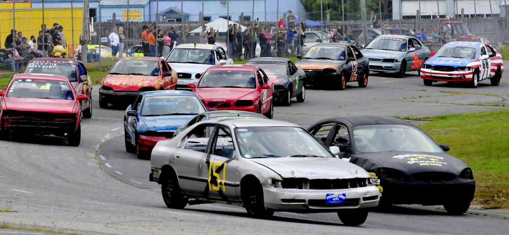 Racers negotiate a turn at the Unity Raceway on Sunday. Racing has returned to the track, which sat idle for much of the summer while the owners looked for a new general manager.