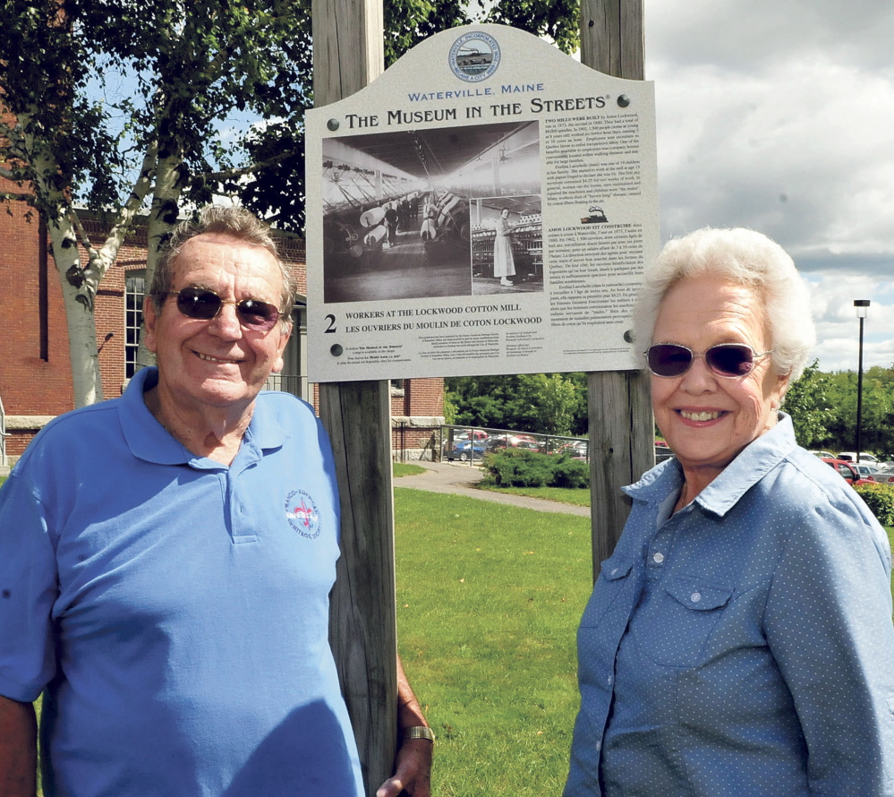 Perley and Alice Lachance, at a Museum in the Streets sign near the Hathaway Center in Waterville on Monday, have been involved with the annual Franco-American Festival since its inception 12 years ago. The festival has been re-named Festival at the Falls and will include a variety of ethnic music and foods and will be held at Head of Falls in Waterville on September 6.