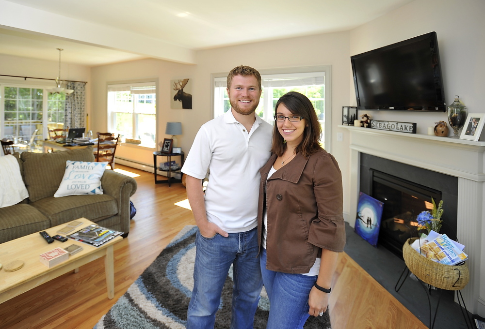 Rob and Sam McNamee show their newly build home in a development in Windham.