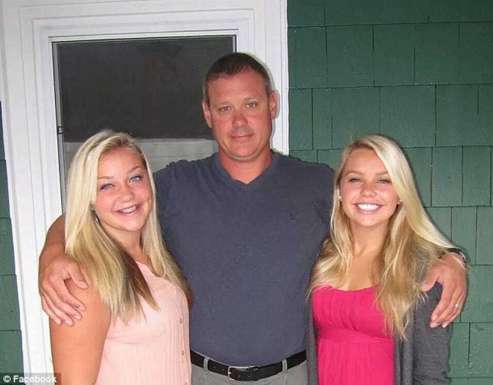 Haley Stoneton, left, and Kelsey, right, with their father Joel, who assumes the job of athletic director at Winthrop High School this year.