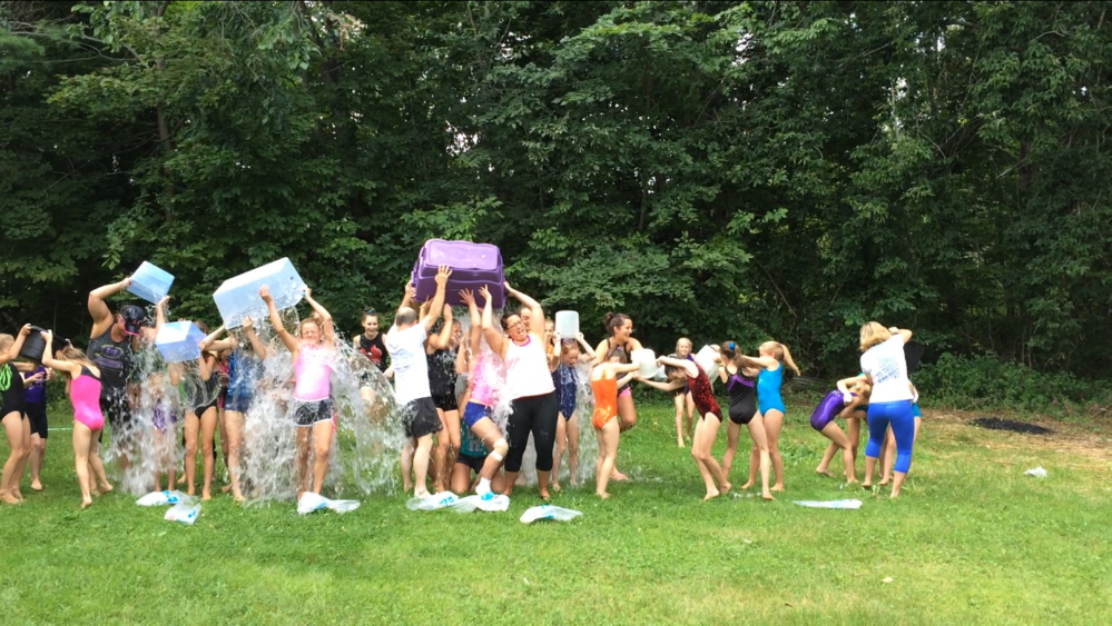 Gymnasts and coaches at Maine-ly Gymnastics in Augusta taking part in the ice bucket challenge for ALS. The gym has called out called out Olympic gymnast Jordan Weber.