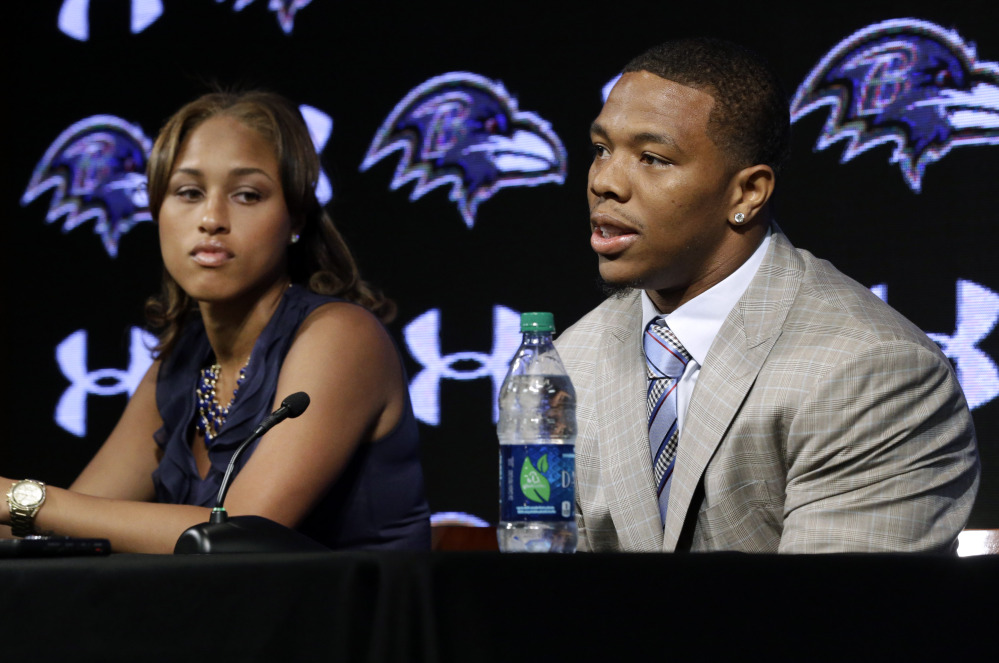 Baltimore Ravens running back Ray Rice, right, speaks alongside his wife, Janay, during a news conference in May in Owings Mills, Md. Rice’s two-game suspension for domestic violence begins Saturday.