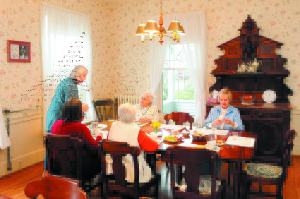 Women enjoy the daily afternoon tea at the St. Mark’s Home in Augusta in 2011.