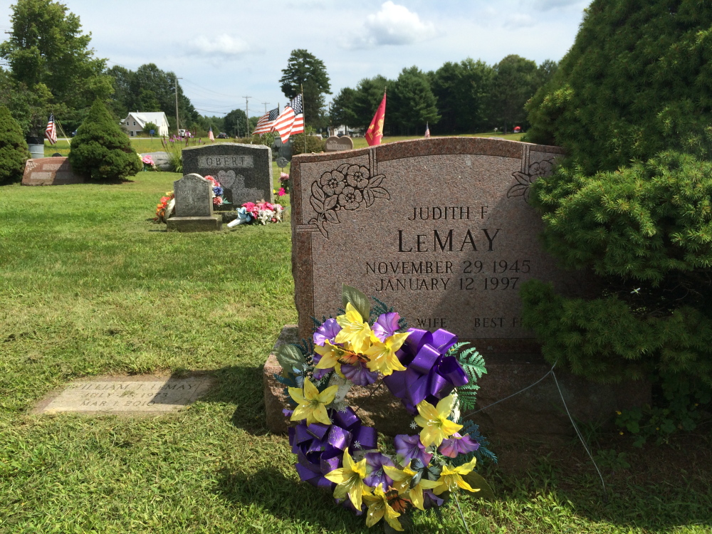 The gravestone of Judith LeMay straddles the boundary between two plots in the Sunset View Cemetery in Norridgewock. LeMay’s father, Kenneth Field, and another family, the Bishops, each have deeds to the plot and have buried relatives there.