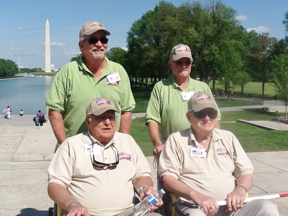 The brothers with their guardians in front of the Washington Monument. The Butler brothers celebrated their 89th birthday in May. The trip was provided at no expense through the Honor Flight Network.