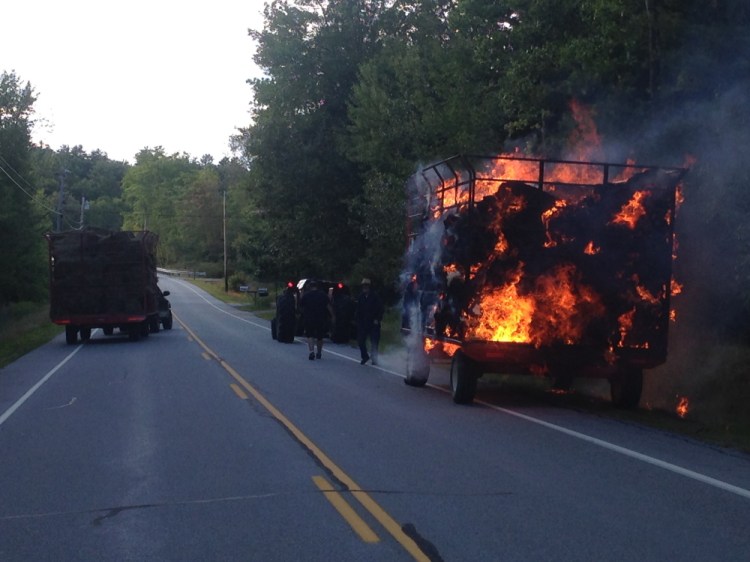 A trailer full of hay burned on Route 126 in West Gardiner Wednesday afternoon. Owner Herbert Moreshead speculated it was started by a cigarette from a passing motorist or sparks from his trailer.