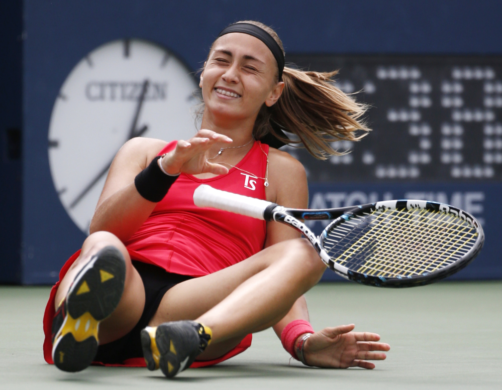 Aleksandra Krunic drops to the court after defeating Petra Kvitova in the third round of the U.S. Open in New York. Krunic won, 6-4, 6-4.