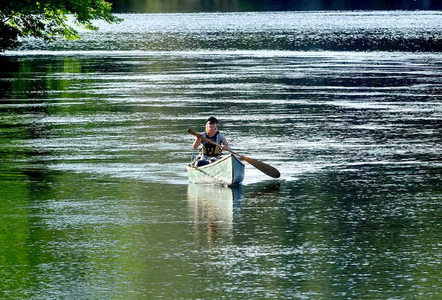 Emily Turner, 26, of Vermont, paddles her homemade canoe Tuesday on the Kennebec River as she finishes the day’s paddle in Skowhegan. Turner started her 500-mile, eight-week trek above Moosehead Lake and expects to end her trip Wednesday in Fairfield.