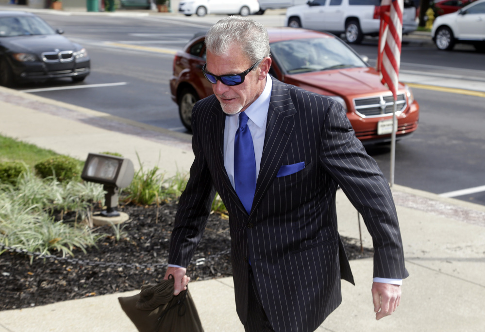 Indianapolis Colts owner Jim Irsay enters Hamilton County court in Noblesville, Ind., Tuesday.