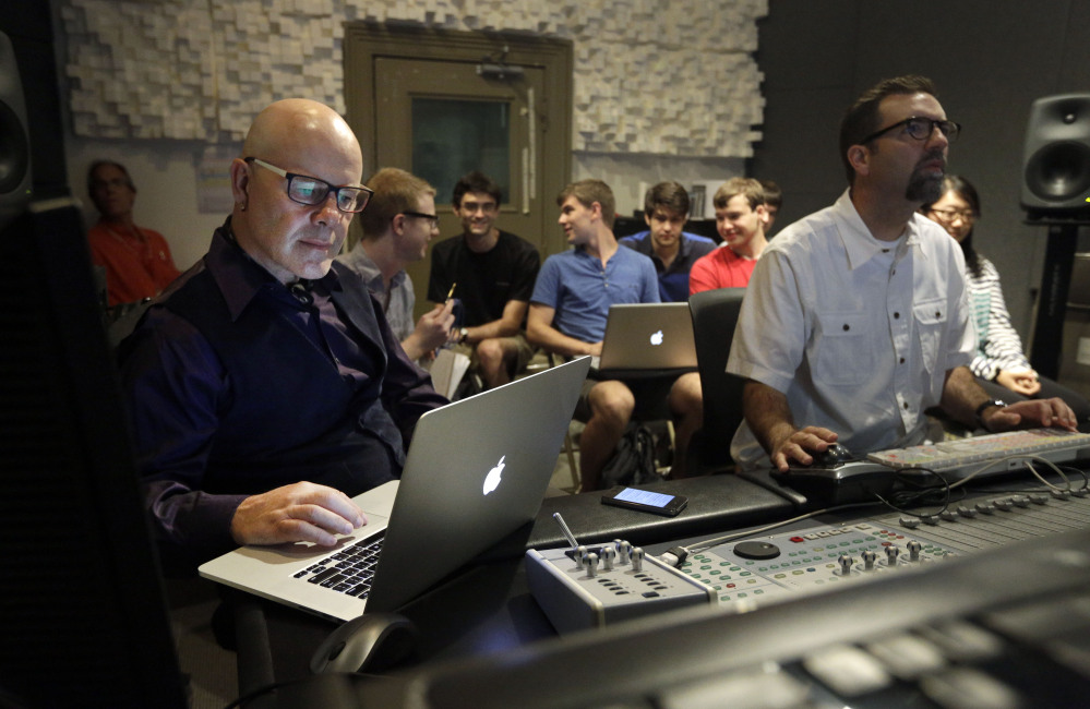 Musician Thomas Dolby, left, prepares for his class, “Sound on Film,” at Johns Hopkins University’s Peabody Institute music conservatory in Baltimore. Dolby, perhaps best known for his 1980’s song “She Blinded Me With Science,” has made several careers at the nexus of sound and electronics.