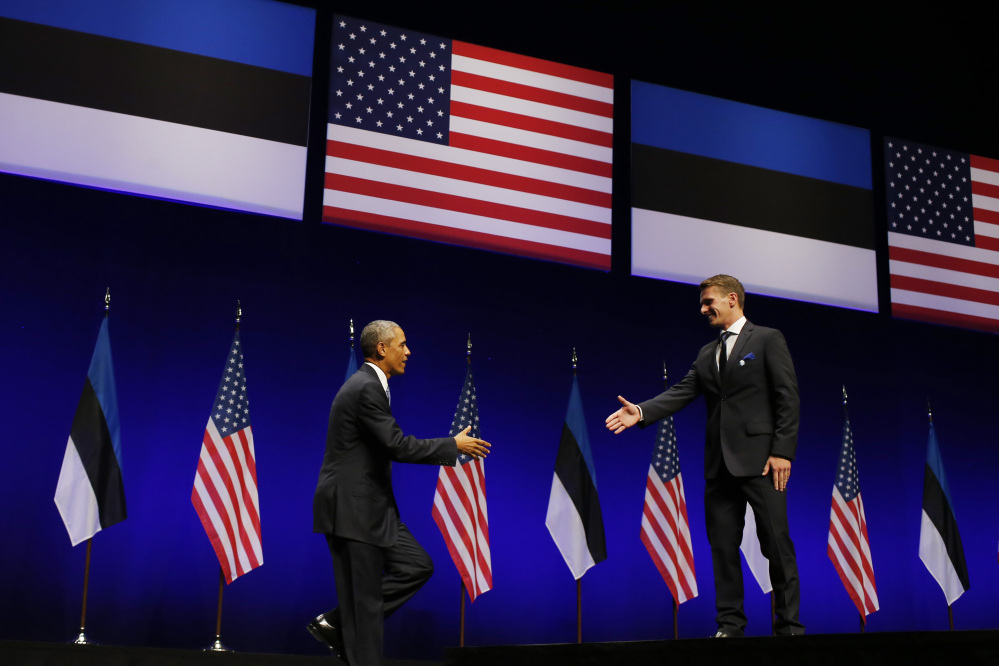 U.S. President Barack Obama is introduced by Oskar Poola, 26, a student at Tallinn University of Technology, at Nordea Concert Hall in Tallinn, Estonia, on Wednesday.