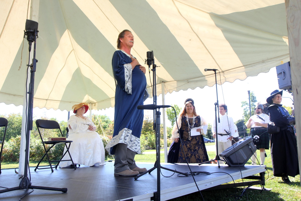 Joe Rowden, of the Recycled Shakespeare Company, plays Theseus and recites lines from “A Midsummer Night’s Dream” at the Festival at the Falls in Waterville on Sunday. The festival, formerly known as the Franco-American Family Festival, was reinvented this year to celebrate a wider variety of Waterville’s cultural heritage.