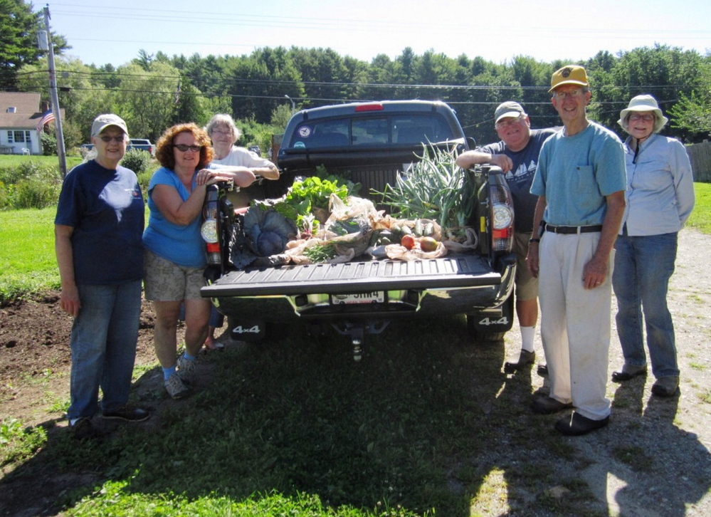 Master Gardener volunteers share their harvest. From left: Virginia Hill, Lori Bryant, Beth Maxwell, John Welsh, Paul Fenton and Merry Fossel.