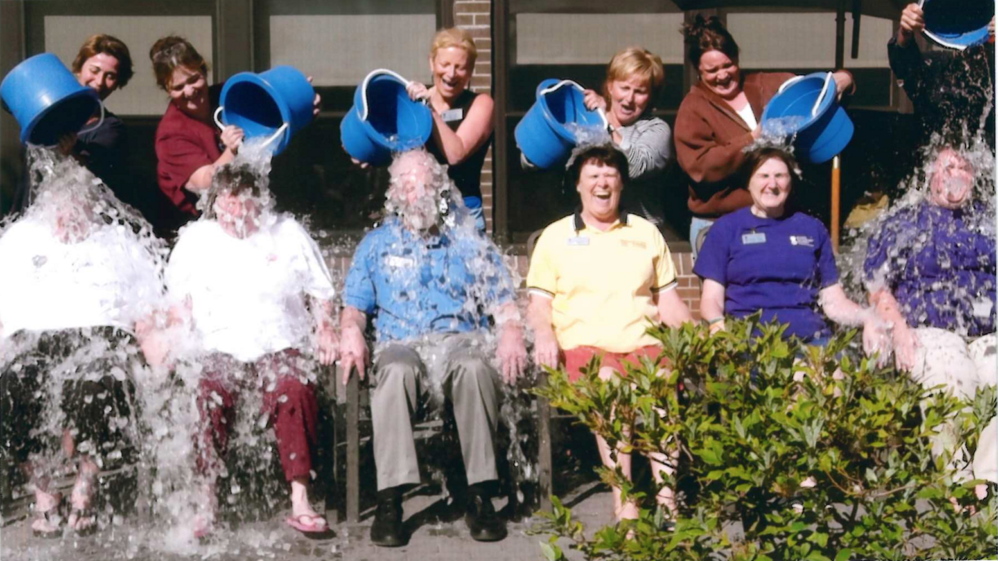 The Maine Veterans’ Home recently participated in the ALS ice bucket challenge and raised more than $300. Maine First Lady Ann LePage and humorist Gary Crocker attended the event. From left are staff members Leslie Pelletier, Lisa Brann, Deb Fournier, LePage, Emily Kane, Crocker. Seated, from left, are staff members Nicky Wight, Judy Fortin, Kelley Kash, Gail Hillstrom, Becky Thayer and Cathi Seraph.