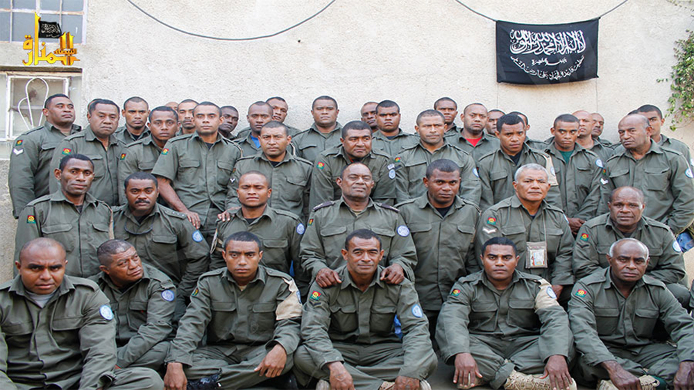 This image from the Hanin Network, a militant website, shows Fijian U.N. peacekeepers who were seized by the Nusra Front on Aug. 28 in the Golan Heights.