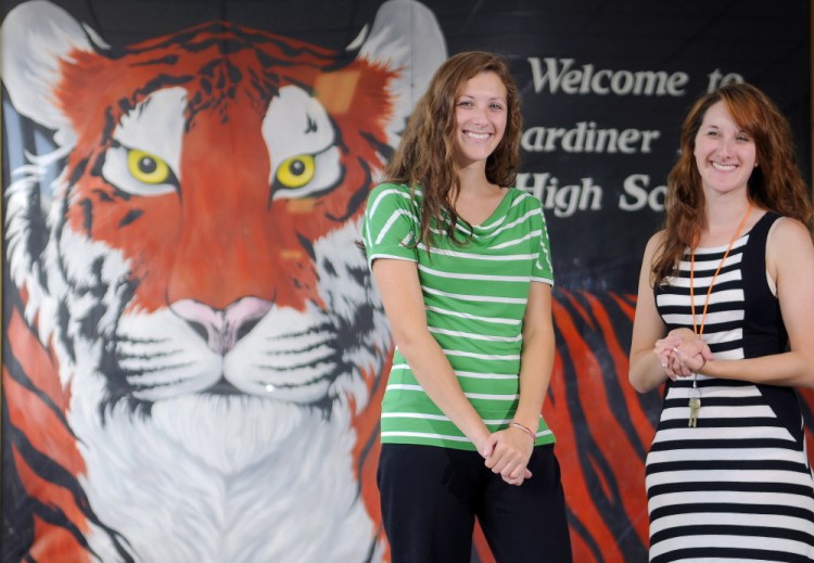 Twins Katie, left, and Emily Collins graduated from Gardiner Area High School, and both now teach there. The West Gardiner women said last week they are excited about working at their alma mater.