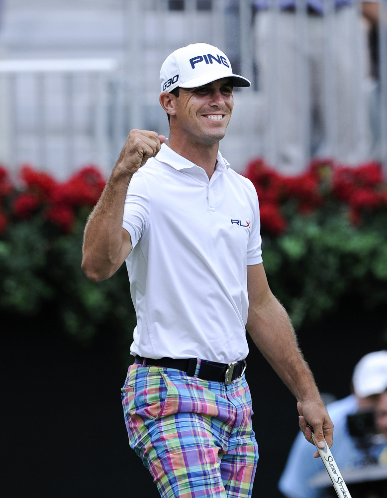 Billy Horschel reacts after sinking a short putt on the 18th green to win the Tour Championship golf tournament and the Fed X Cup Sunday, in Atlanta.
