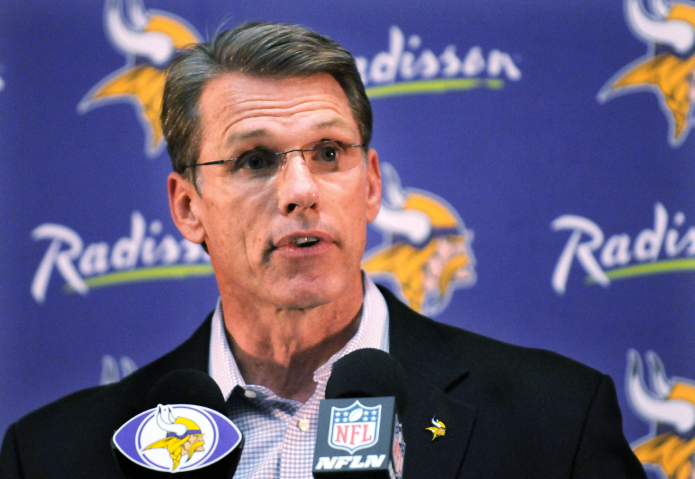 Minnesota Vikings General Manager Rick Spielman speaks to reporters Monday as the Minnesota Vikings announced they reinstated Adrian Peterson as the running back faces a charge of reckless or negligent injury to a child. Spielman said, “I understand this is a difficult thing to handle, but we feel strongly as an organization that this is disciplining a child. Whether it’s an abusive situation or not, whether he went too far disciplining, we feel strongly that that is the court’s decision to make.”