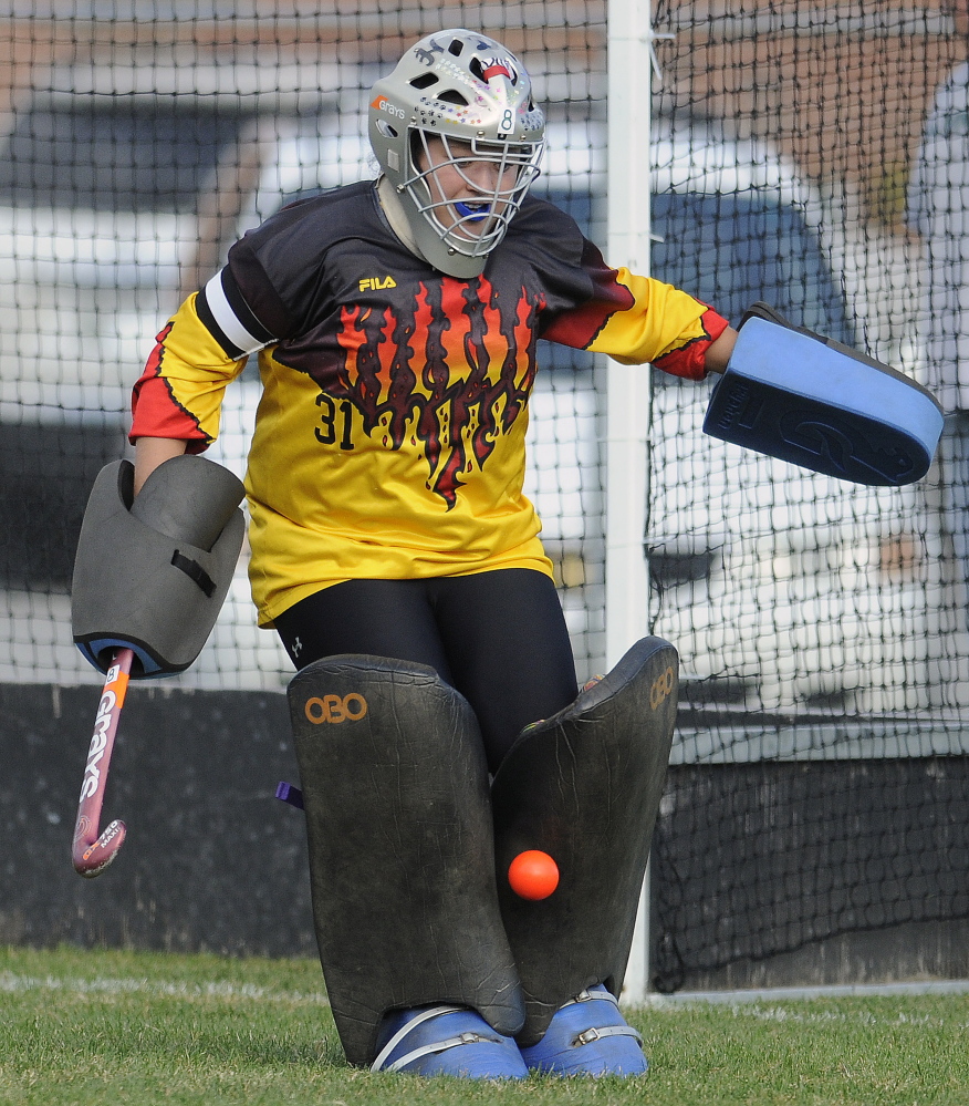 Hall-Dale High School goalie Molly French turns aside a shot during a Mountain Valley Conference game Monday against Winthrop.