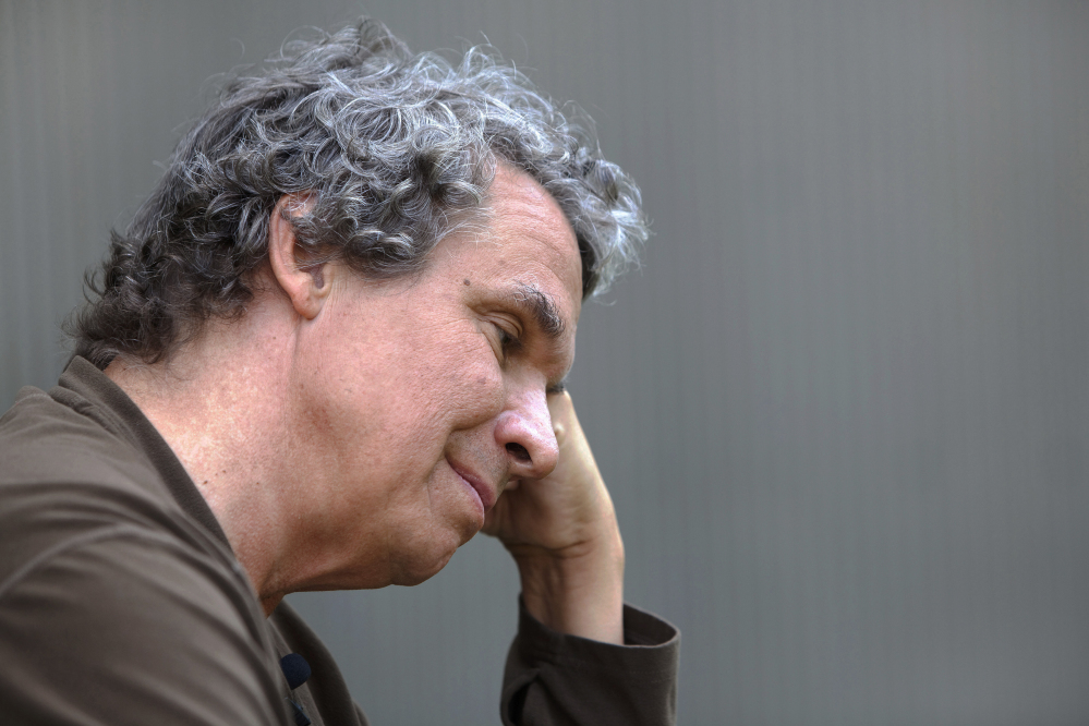 Author and founder of the Central Asia Institute charity Greg Mortenson pauses during an interview with The Associated Press at his home in Bozeman, Mont., on Tuesday.